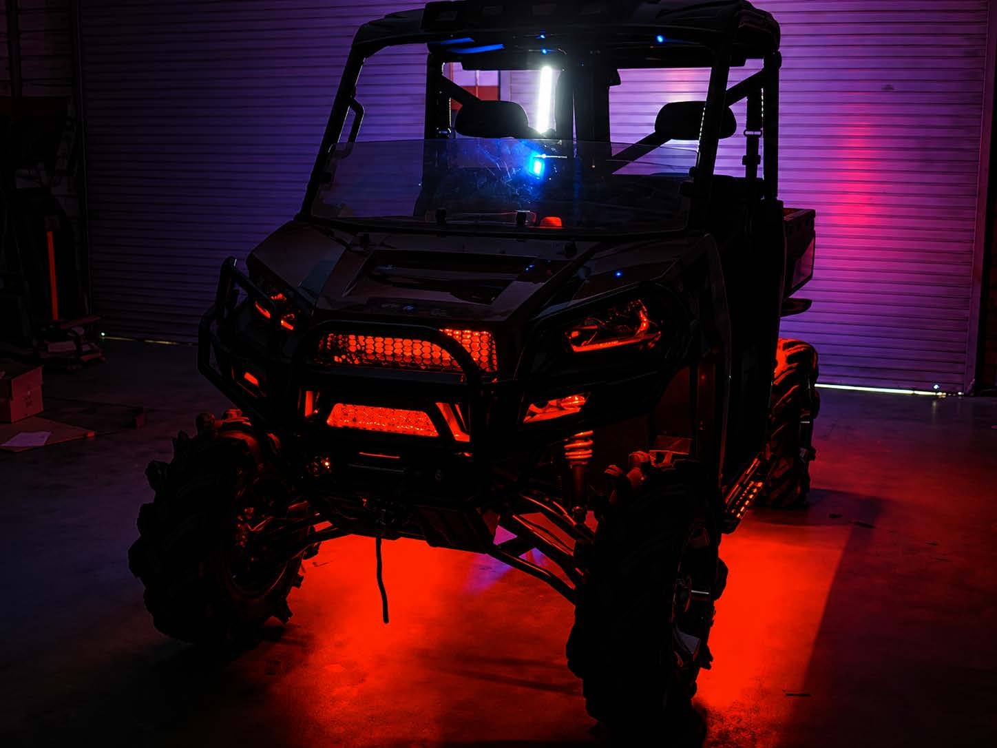 UTV with red & blue LED underglow lighting